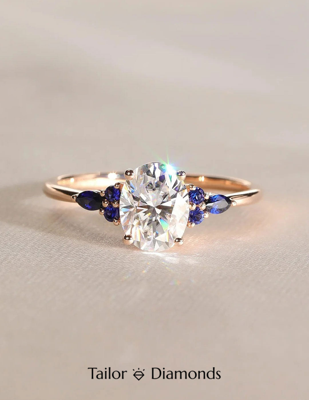 Diamond Claw Oval Diamond Royal Blue Sapphire Ring